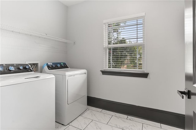 laundry room with washing machine and dryer