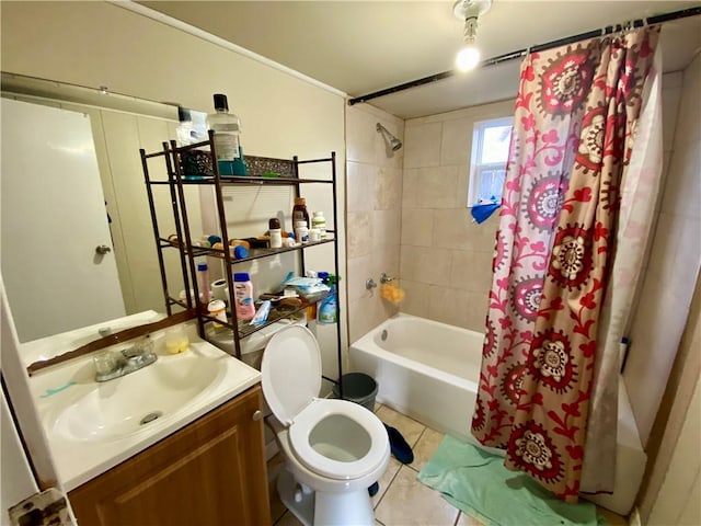 full bathroom with vanity, tile patterned floors, toilet, and shower / tub combo