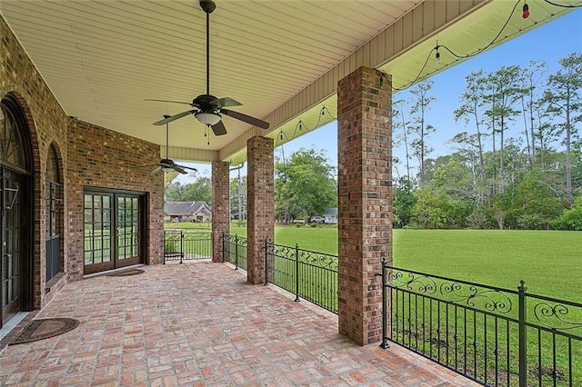 view of patio / terrace with french doors and ceiling fan