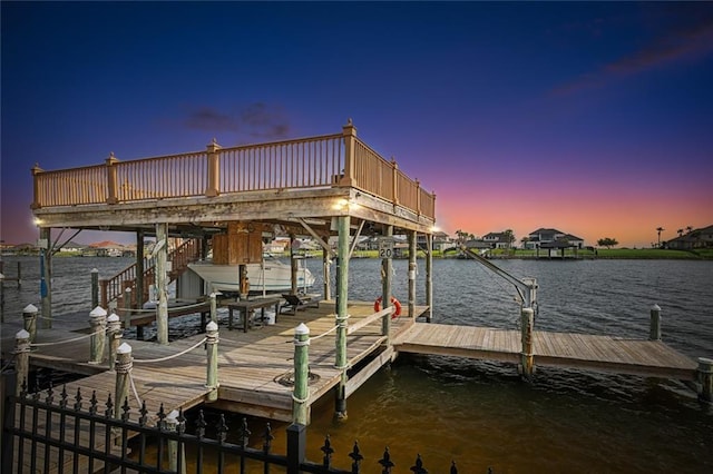 view of dock with a water view