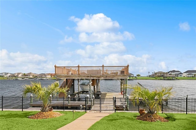 exterior space featuring a water view and a lawn