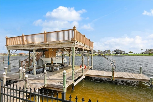 dock area with a water view