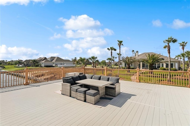 deck featuring a water view