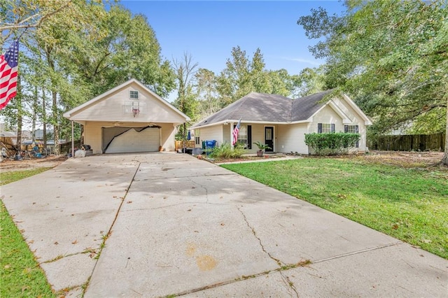 ranch-style home with a garage, a carport, and a front lawn