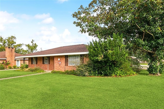 ranch-style house with a front yard