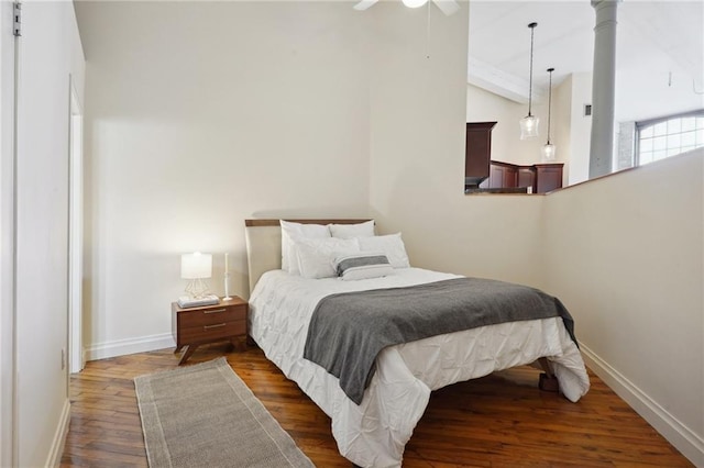 bedroom featuring dark hardwood / wood-style flooring and ceiling fan