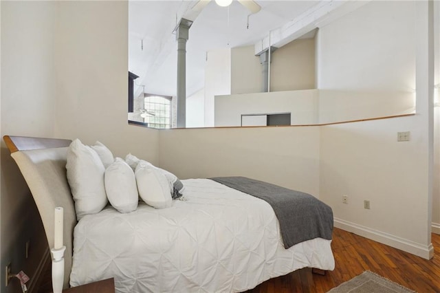 bedroom with ceiling fan and dark hardwood / wood-style floors