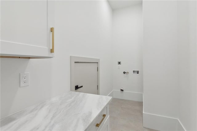 laundry area with washer hookup, cabinets, and hookup for an electric dryer