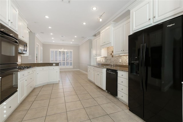 kitchen with light tile patterned flooring, white cabinetry, ornamental molding, and black appliances