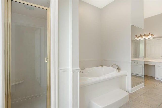 bathroom featuring separate shower and tub, tile patterned flooring, and vanity