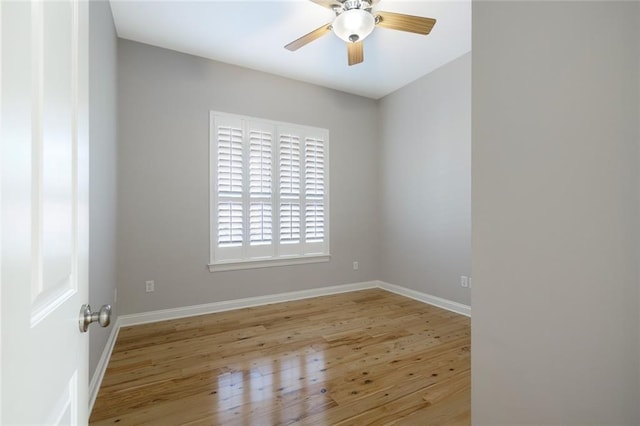 empty room featuring ceiling fan and light hardwood / wood-style floors