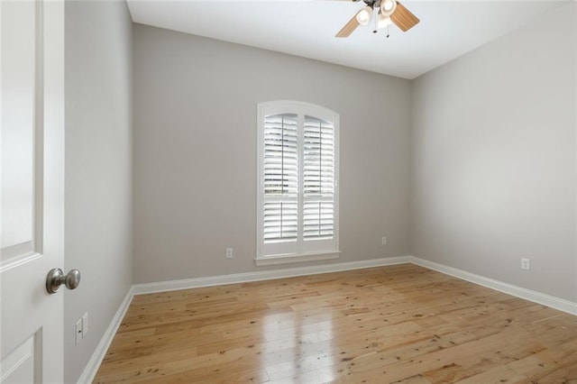 empty room with light hardwood / wood-style floors and ceiling fan