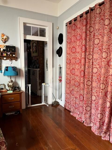928 Independence St, New Orleans, LA 70117 - interior space featuring dark wood finished floors