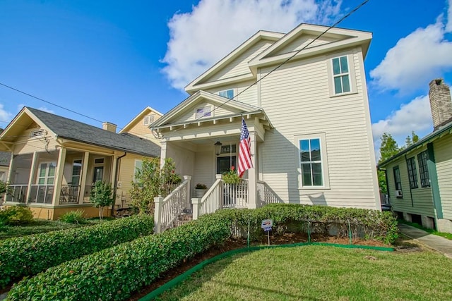 view of front facade with a front yard