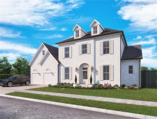 colonial home featuring a front lawn