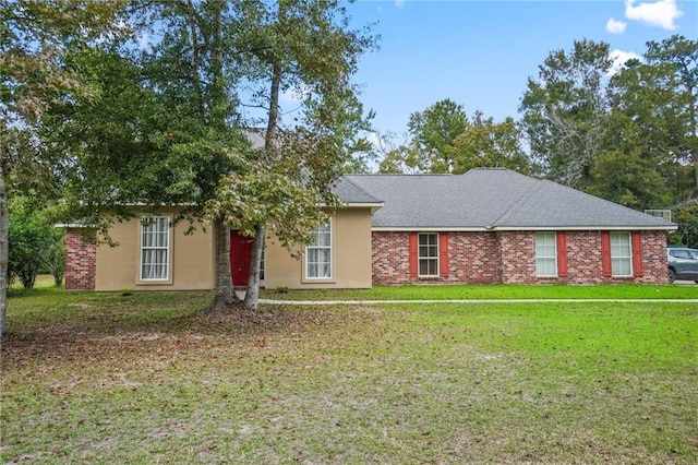 ranch-style house with a front lawn