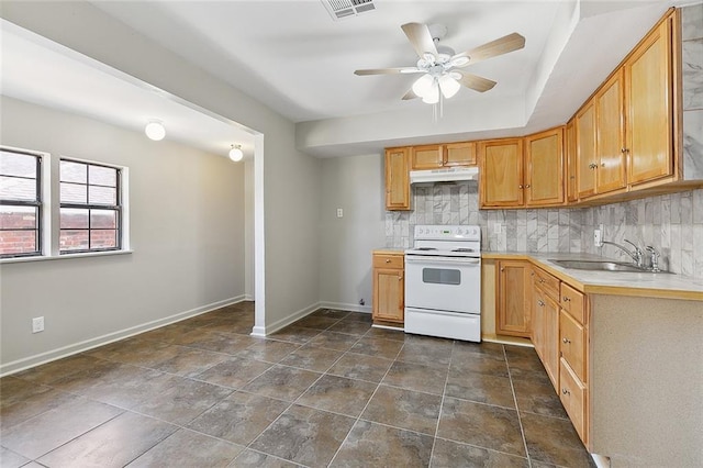 kitchen with ceiling fan, sink, decorative backsplash, and electric range