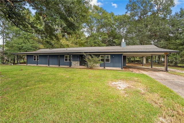 ranch-style house with a carport and a front yard