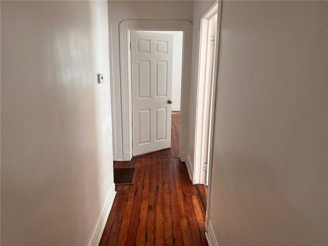 3633 Franklin Ave, New Orleans, LA 70122 - hall with dark wood-style floors and baseboards