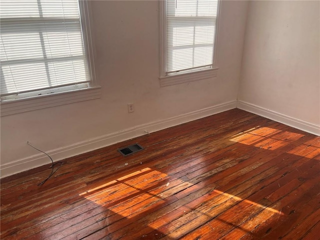3633 Franklin Ave, New Orleans, LA 70122 - empty room with dark wood-type flooring and baseboards