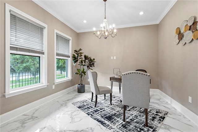 dining room with an inviting chandelier, marble finish floor, baseboards, and crown molding