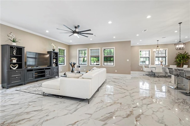 living area featuring ceiling fan with notable chandelier, marble finish floor, ornamental molding, recessed lighting, and baseboards