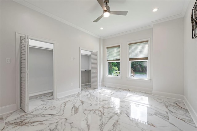 unfurnished bedroom featuring baseboards, multiple closets, and recessed lighting