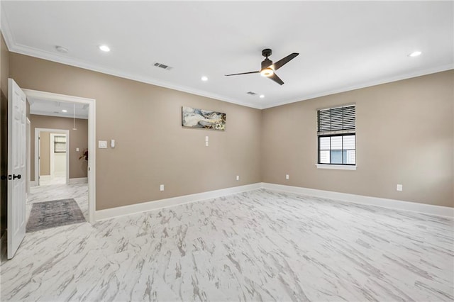 unfurnished room featuring a ceiling fan, attic access, marble finish floor, visible vents, and crown molding