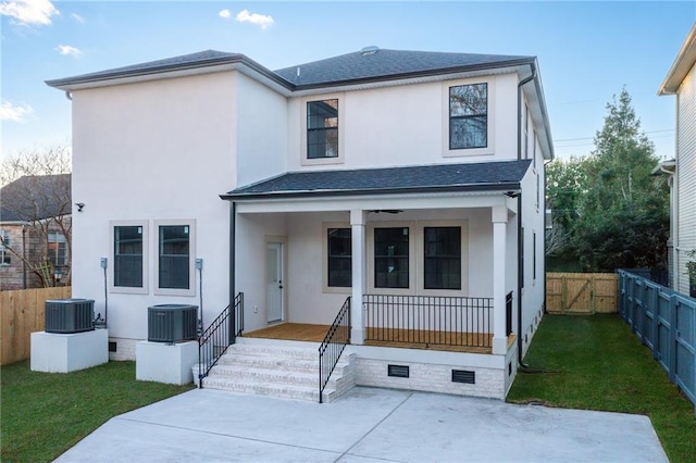 view of front facade featuring central air condition unit, a porch, crawl space, and fence private yard
