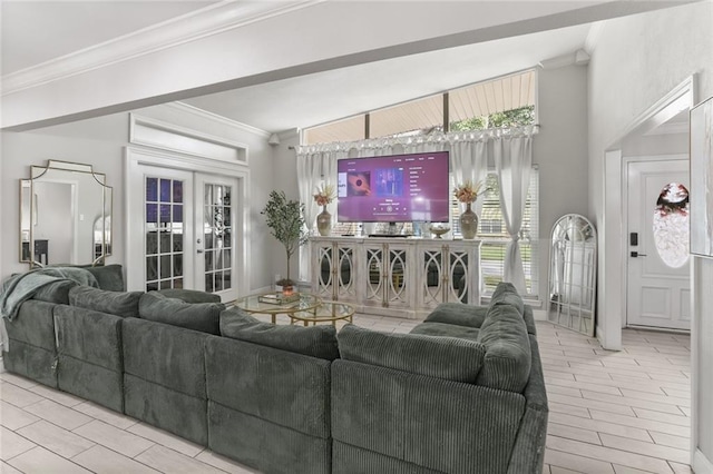 living room with french doors, light hardwood / wood-style floors, and crown molding