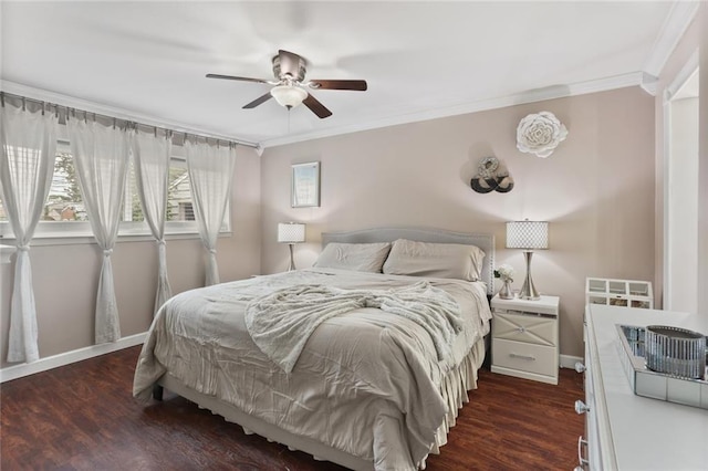 bedroom with dark wood-type flooring, ceiling fan, and crown molding