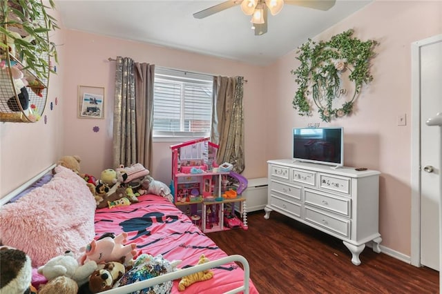 bedroom with dark wood-type flooring and ceiling fan