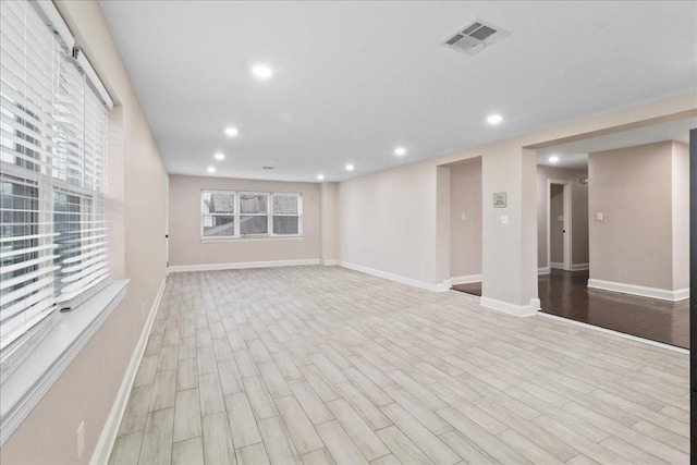 basement featuring light hardwood / wood-style floors