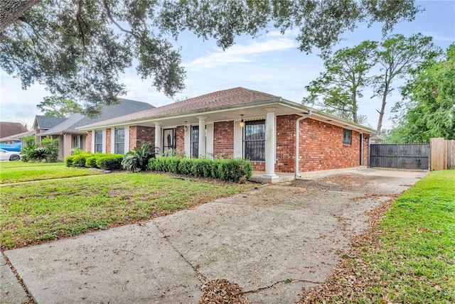 ranch-style house with a front yard