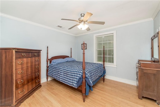 bedroom featuring light hardwood / wood-style floors, ceiling fan, and ornamental molding