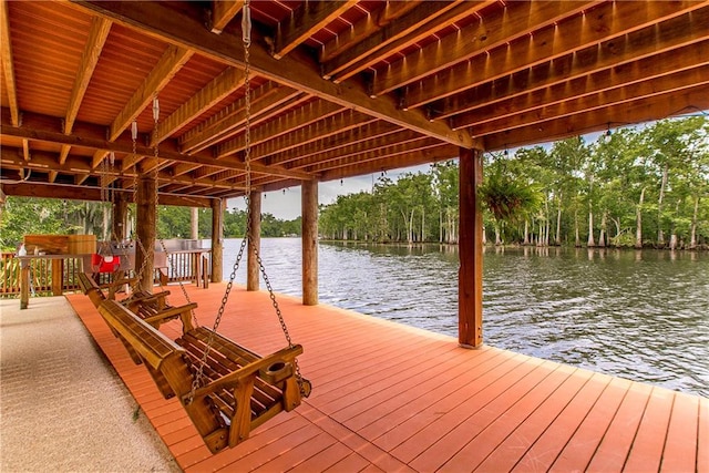 dock area with a water view