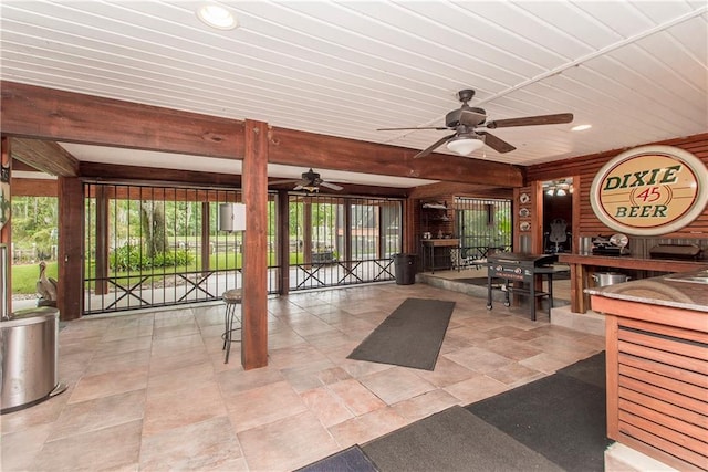 interior space featuring ceiling fan