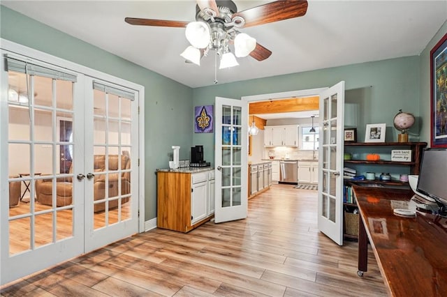 interior space featuring french doors and light wood-style floors