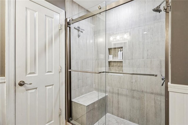 full bath featuring a shower stall