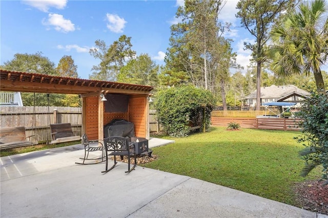 view of yard with a patio and a fenced backyard