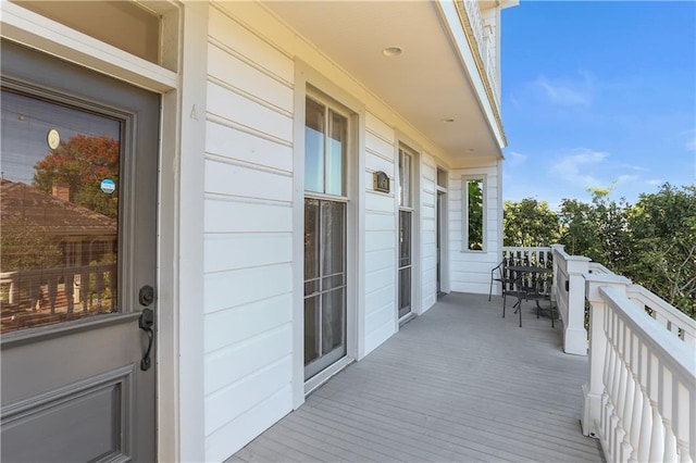 wooden balcony featuring a wooden deck