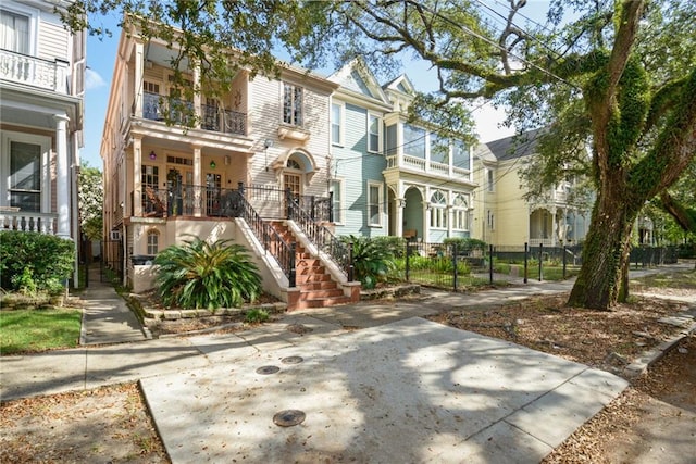 view of property with a balcony