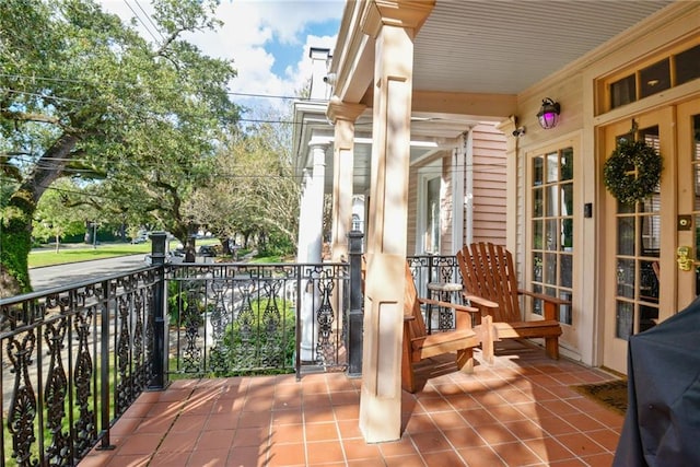 balcony featuring a porch