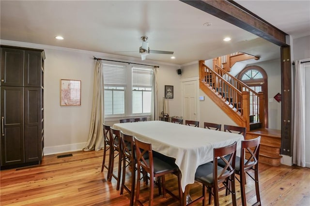 dining room featuring plenty of natural light, ceiling fan, and light hardwood / wood-style flooring