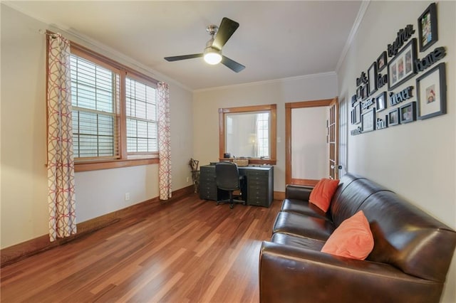 living room featuring ceiling fan, wood-type flooring, and ornamental molding