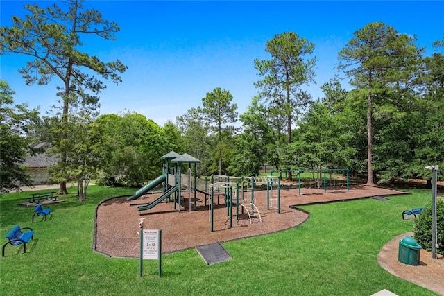 view of playground featuring a lawn