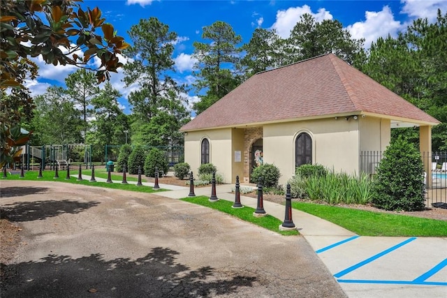 view of property's community with a playground