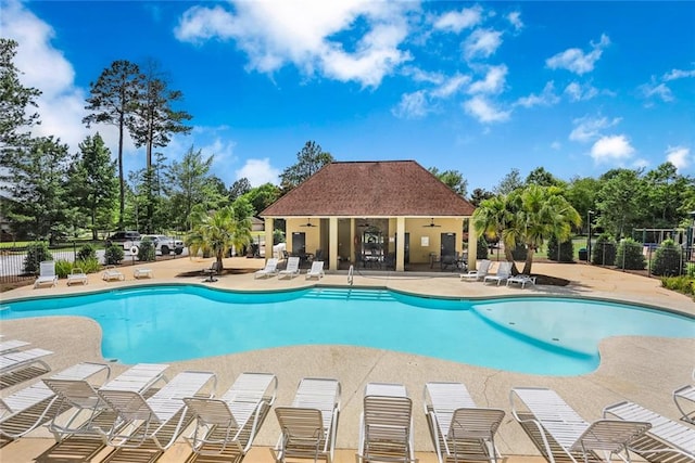 view of swimming pool featuring a patio