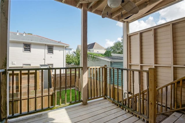 wooden terrace featuring ceiling fan