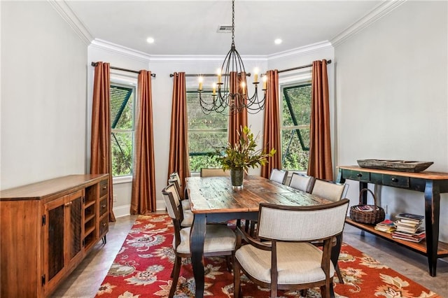 dining area with ornamental molding and a notable chandelier